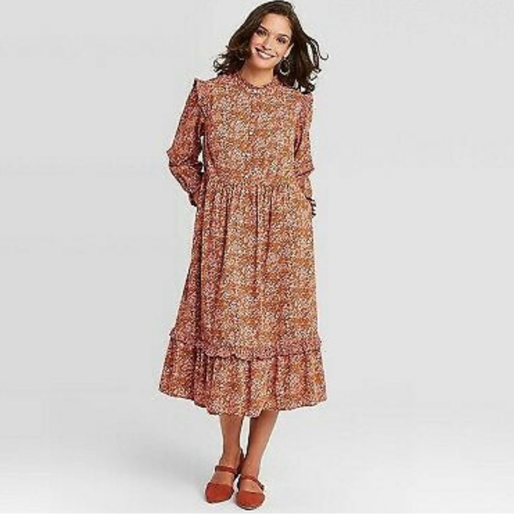 Midi floral Dress women’s size M
Boho-Chic w/ruffle detail
Cottage core
